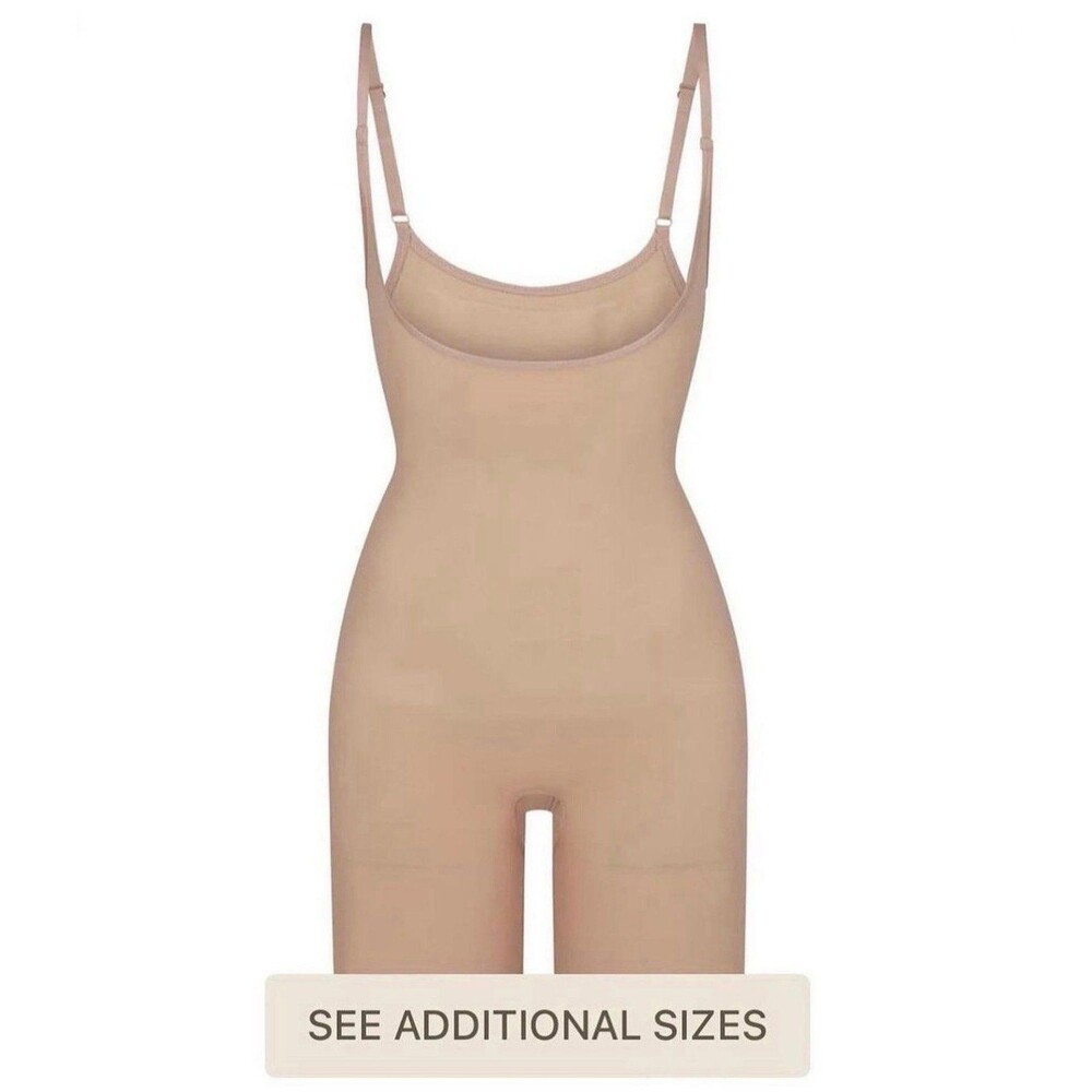 Skims seamless sculpt butt lifting open bust bodysuit bronze